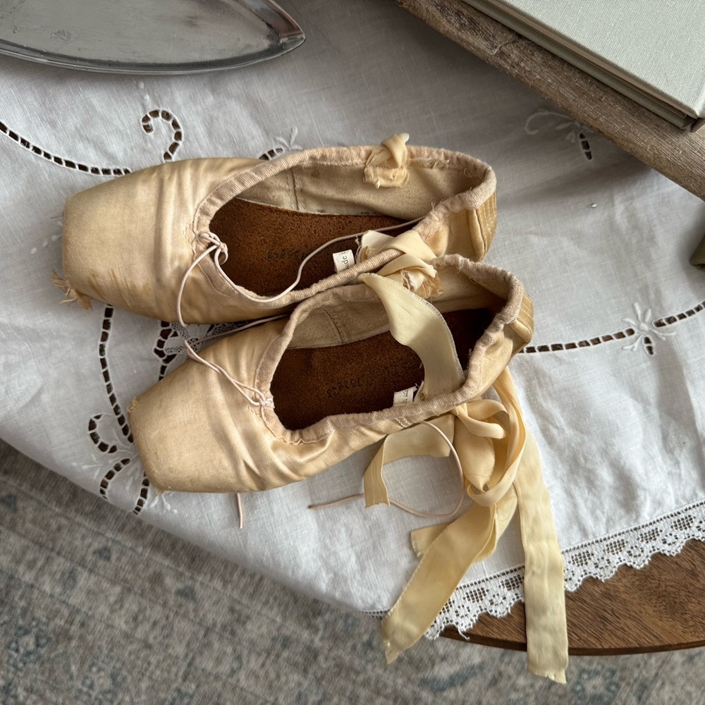 vintage children’s ballet shoes for decor